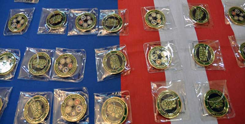challenge coins on a table