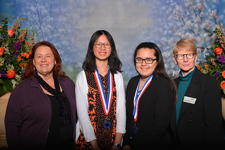 Photo of Trustee Jackie Boschock, President Suzanne Johnson and All Washington Academic Team scholars Sharon Gozali and Anna Matsumoto