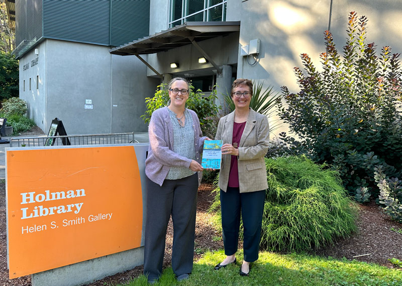 Chris Lilyblad book donation to Holman Library