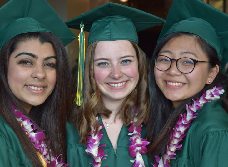 Photo of Green River College student Kiki Van Essen with friends at graduation