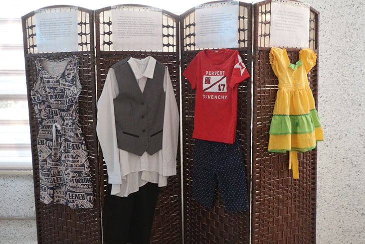 Aisuluu's project, a sample of the clothing exhibit containing an outfit paired with each victim’s story.