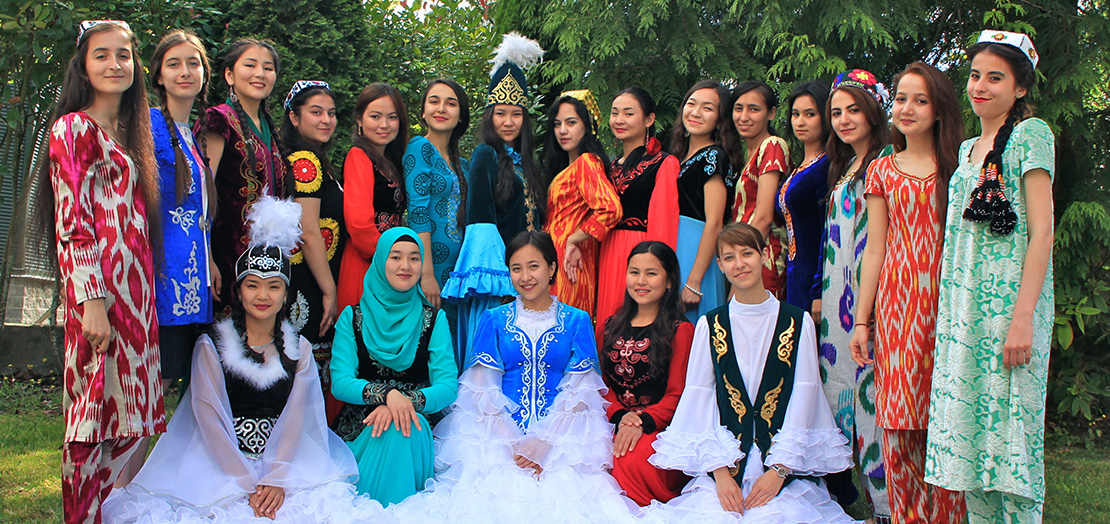 Students from 2016 Women's Leadership Institute wear their traditional regalia