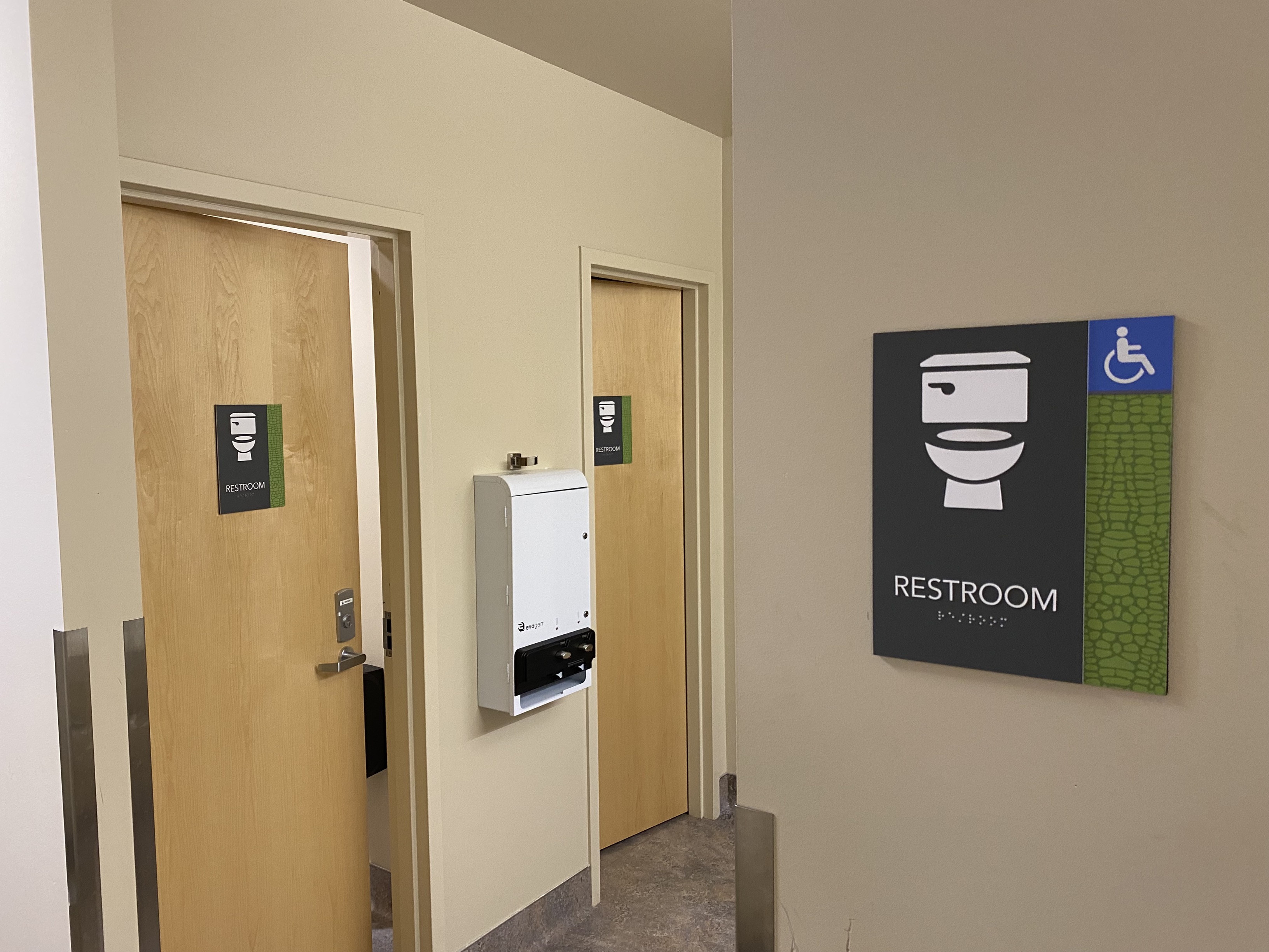 New signage in the West Building in indicating a single-stall gender-neutral restrooms