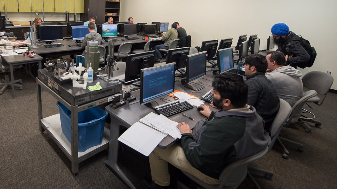 Photo of students in Design Drafting computer lab